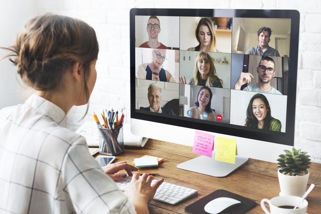 Female remote staff having a conference call on computer